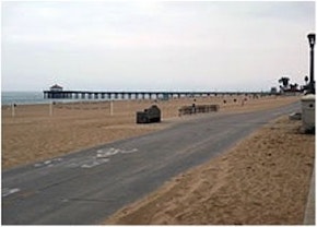 Manhattan Beach Los Angeles County, CA pier and concrete bike path by the Pacific Ocean and famous and beautiful Strand. Usually occupied by many bike riders, roller bladders and pedestrians.