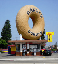 The landmark Randy Donuts is located in Inglewood, which is a city just southwest of downtown Los Angeles, Calif. Inglewood is also home to the fabulous Forum, which used to host the Los Angeles Lakers and the Los Angeles Kings hockey team, but since has been converted into a beautiful venue for concerts.